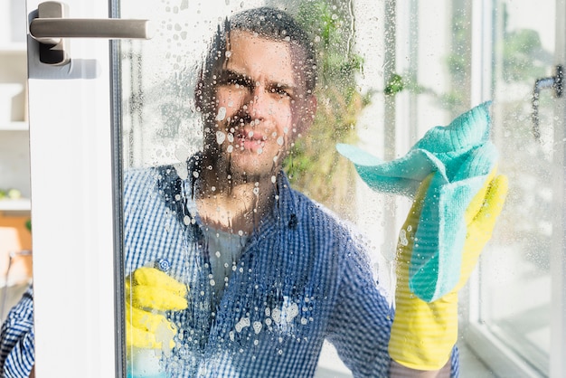 Man cleaning his home