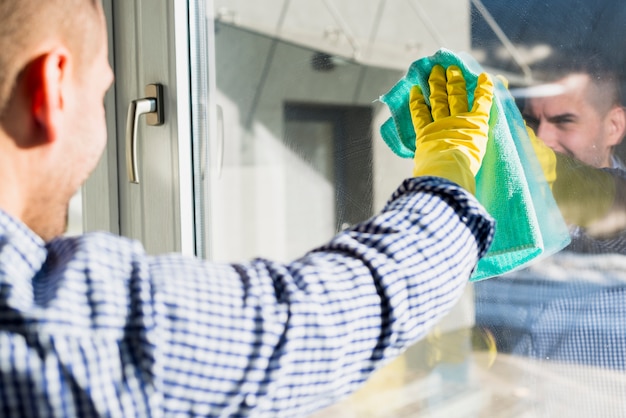 Man cleaning his home