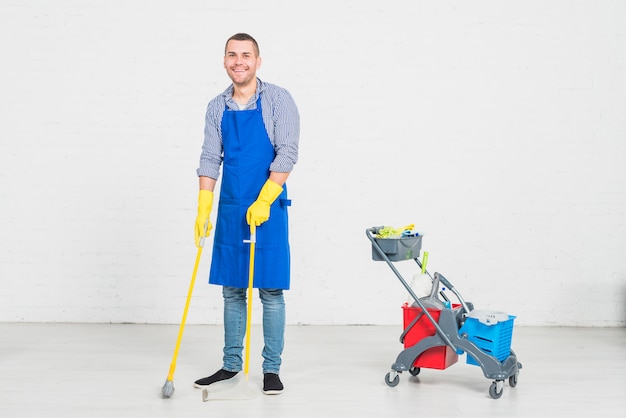 man cleaning his home