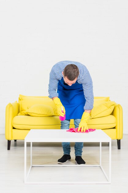 Man cleaning his home