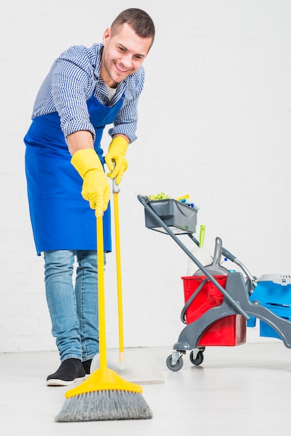 Man cleaning his home