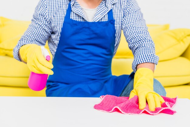 Man cleaning his home