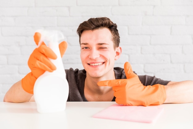 Man cleaning his home