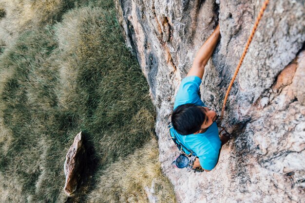 Man climbing wall