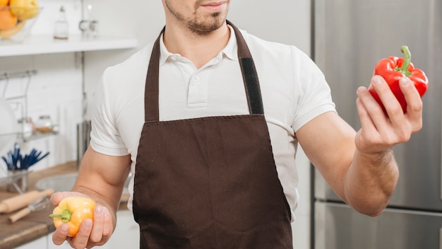 Free photo man cooking at home