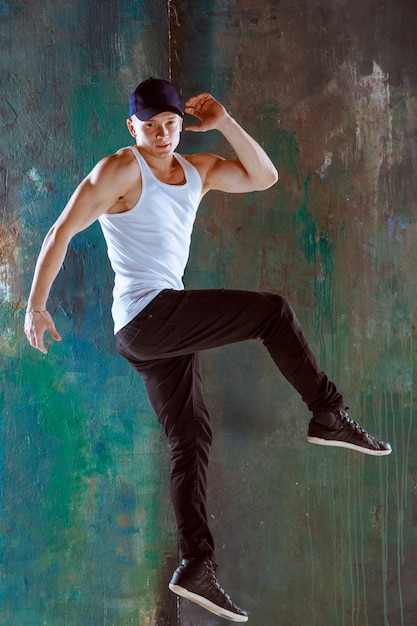 Free photo the man dancing hip hop choreography