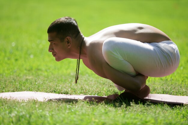 Man doing the frog posture