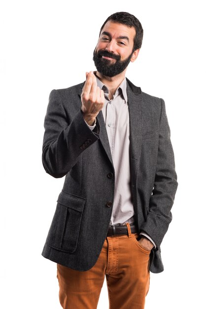 Man doing a money gesture