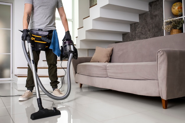 Man doing professional home cleaning service