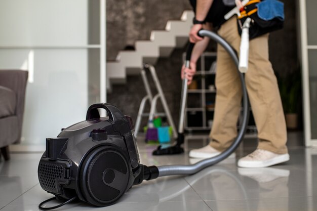 Man doing professional home cleaning service