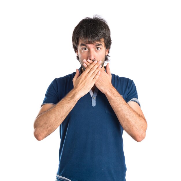 Man doing surprise gesture over white background