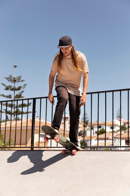 Man doing tricks on ramp full shot