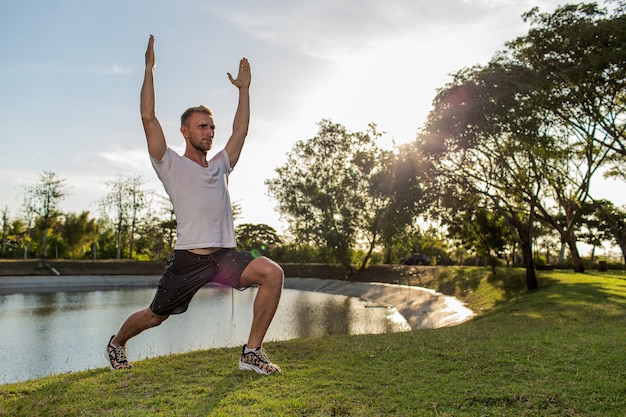 Man doing warm-up in the park.