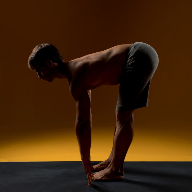 Man doing yoga exercise