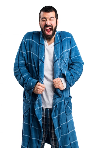 Man in dressing gown shouting