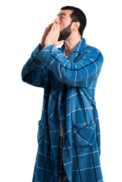 Man in dressing gown shouting