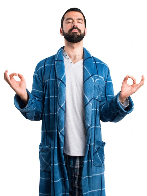 Free photo man in dressing gown in zen position