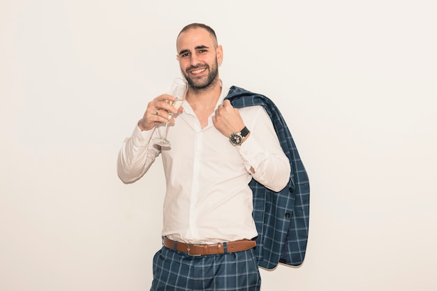 Free photo man drinking champagne from glass