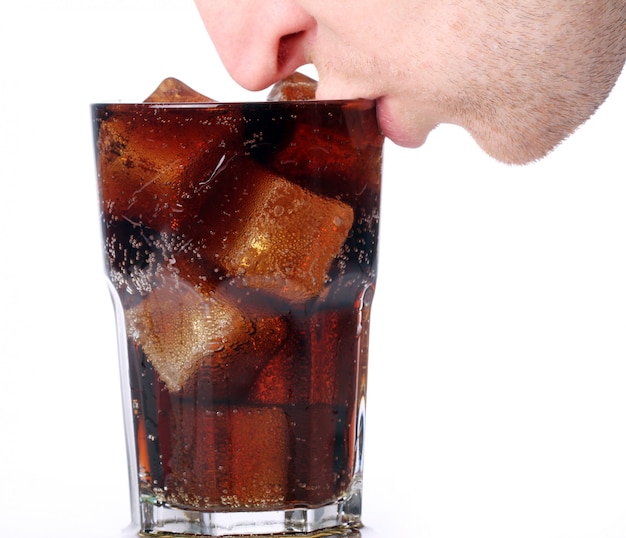 Free photo man drinking cold cola