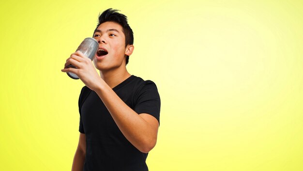 Man drinking from an energy drink
