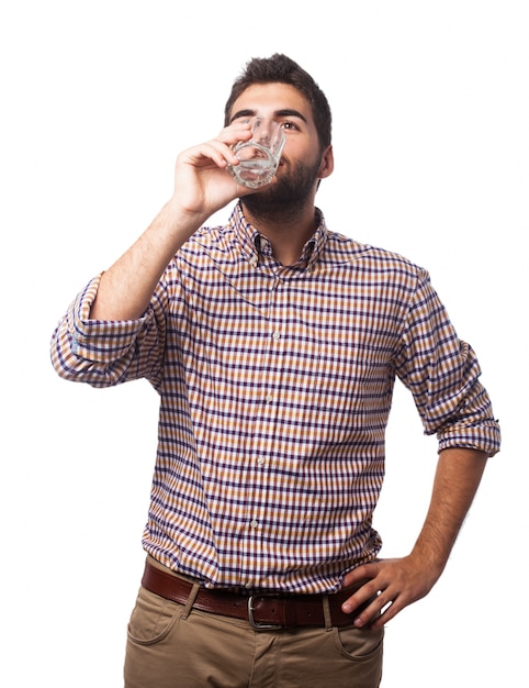 Free photo man drinking from a glass