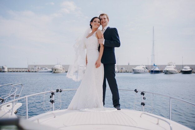 Man embracing her wife on a boat