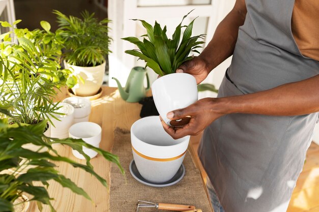 Free photo man enjoying indoor farming