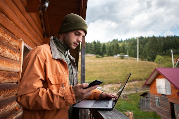 Free photo man enjoying rural surroundings