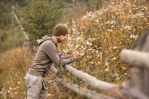 Free photo man enjoying rural surroundings