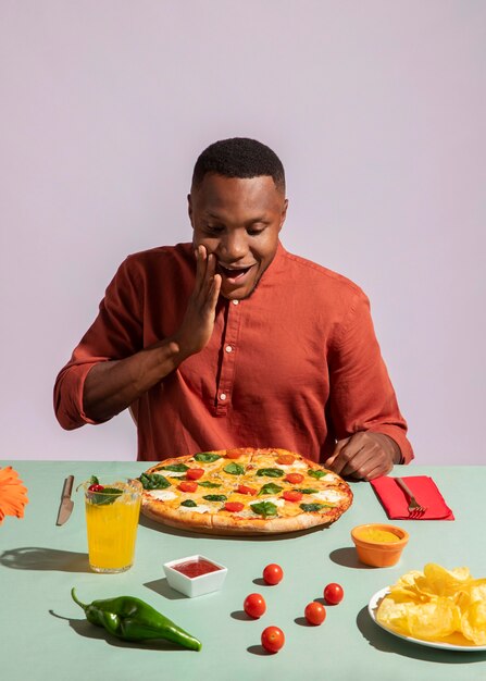 Man enjoying some delicious italian food