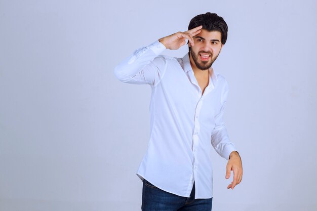 Man feeling positive and giving smiling poses.