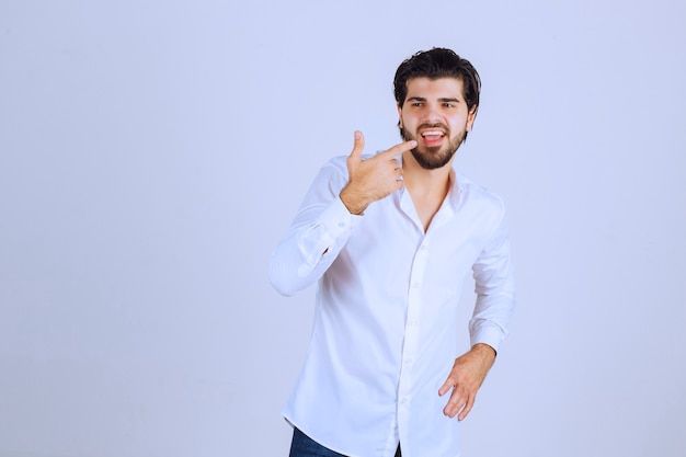 Man feeling positive and giving smiling poses. 