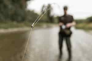 Free photo man fishing at the river