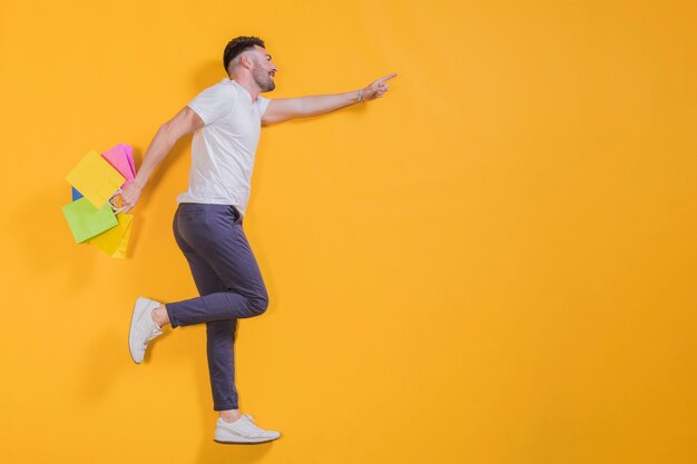 Man floating with shopping bags