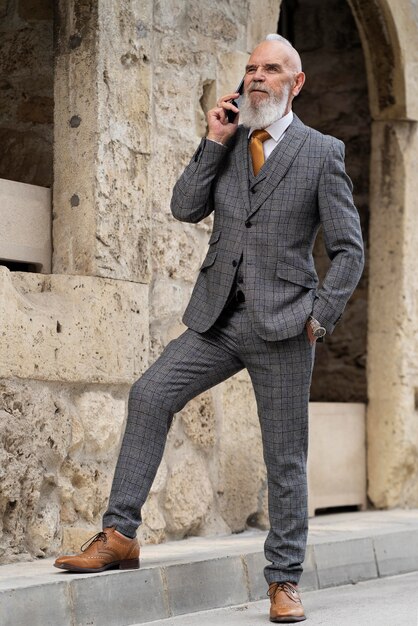 Man in formal clothes talking on the phone