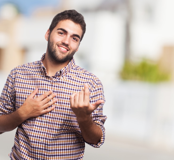 Free Photo man gesturing to come closer
