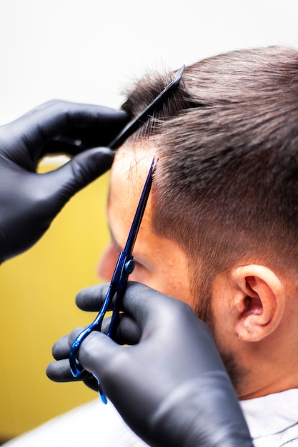 Man getting a haircut high view