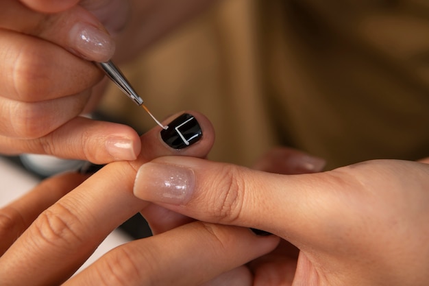 Man getting a manicure top view