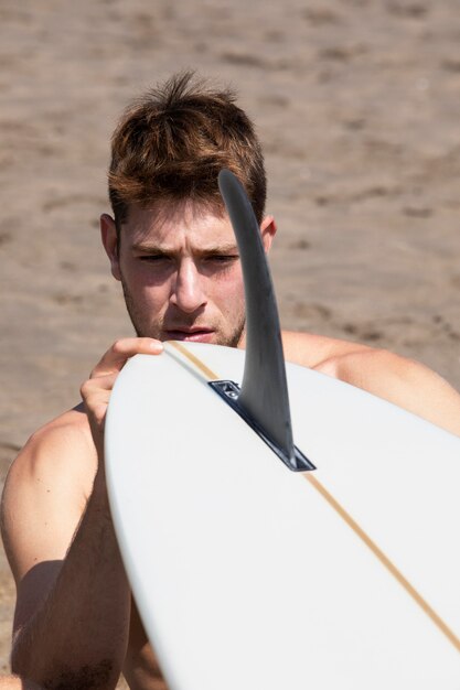 Man getting ready to use his surf board