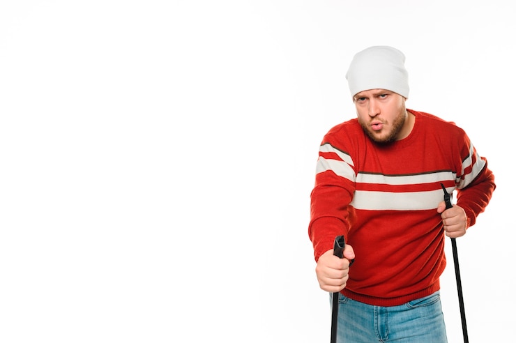 Free Photo man getting ready for winter sports