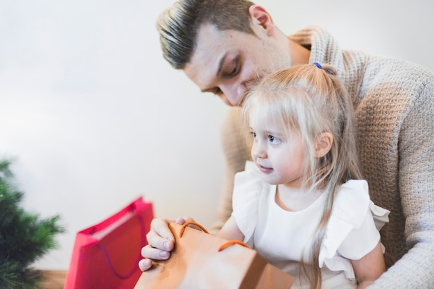 Man and girl at christmas