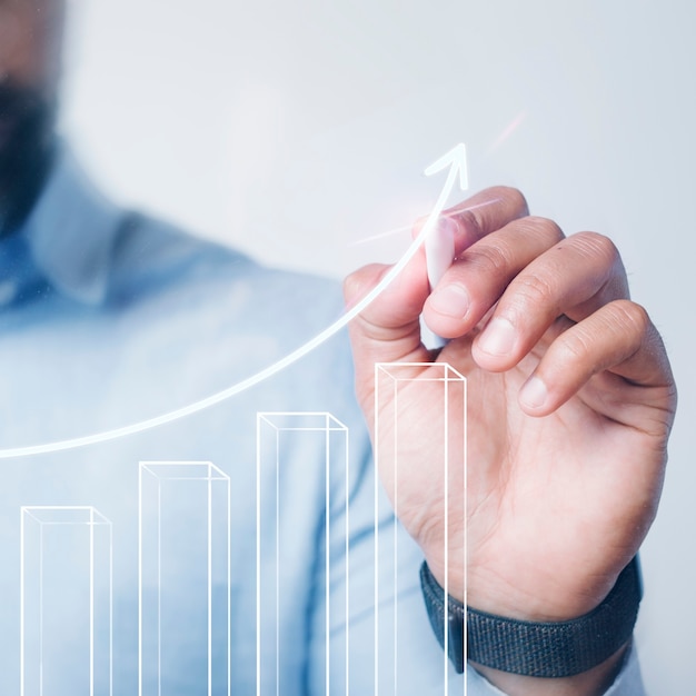 Free Photo man giving a bar graph presentation using a high technology digital pen