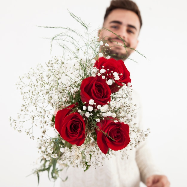 Man Giving Flowers To Camera