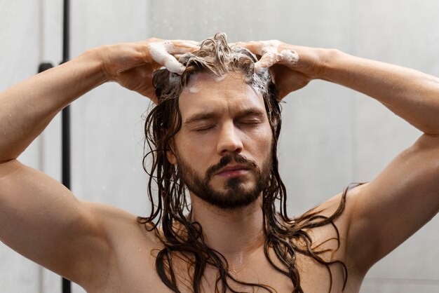 Man giving himself  scalp massage
