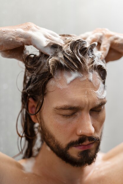 Man giving himself  scalp massage