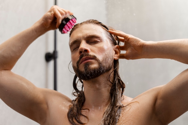 Man giving himself  scalp massage