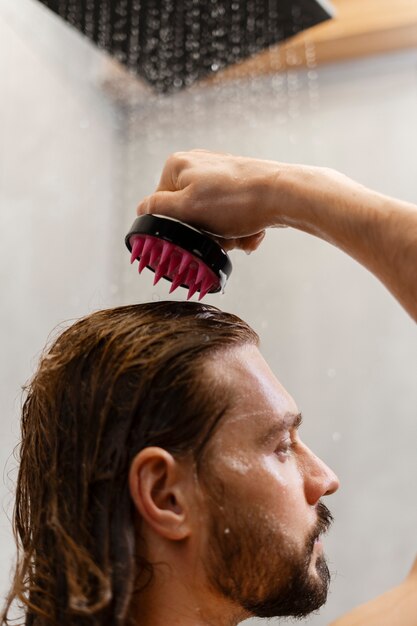 Man giving himself  scalp massage