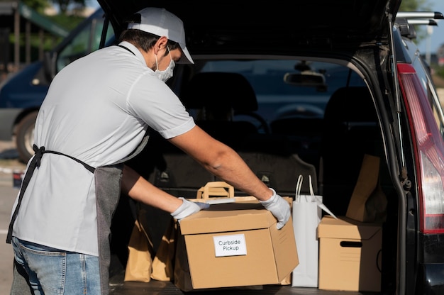 Man giving an order for a curbside pickup