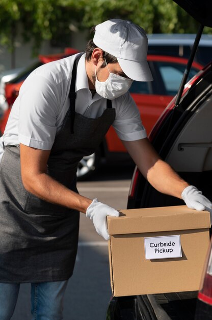 Man giving an order for a curbside pickup