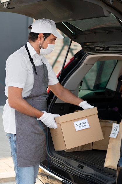 Man giving an order for a curbside pickup